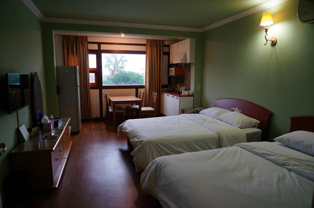 Park Beach Hotel Jeju Quarto foto